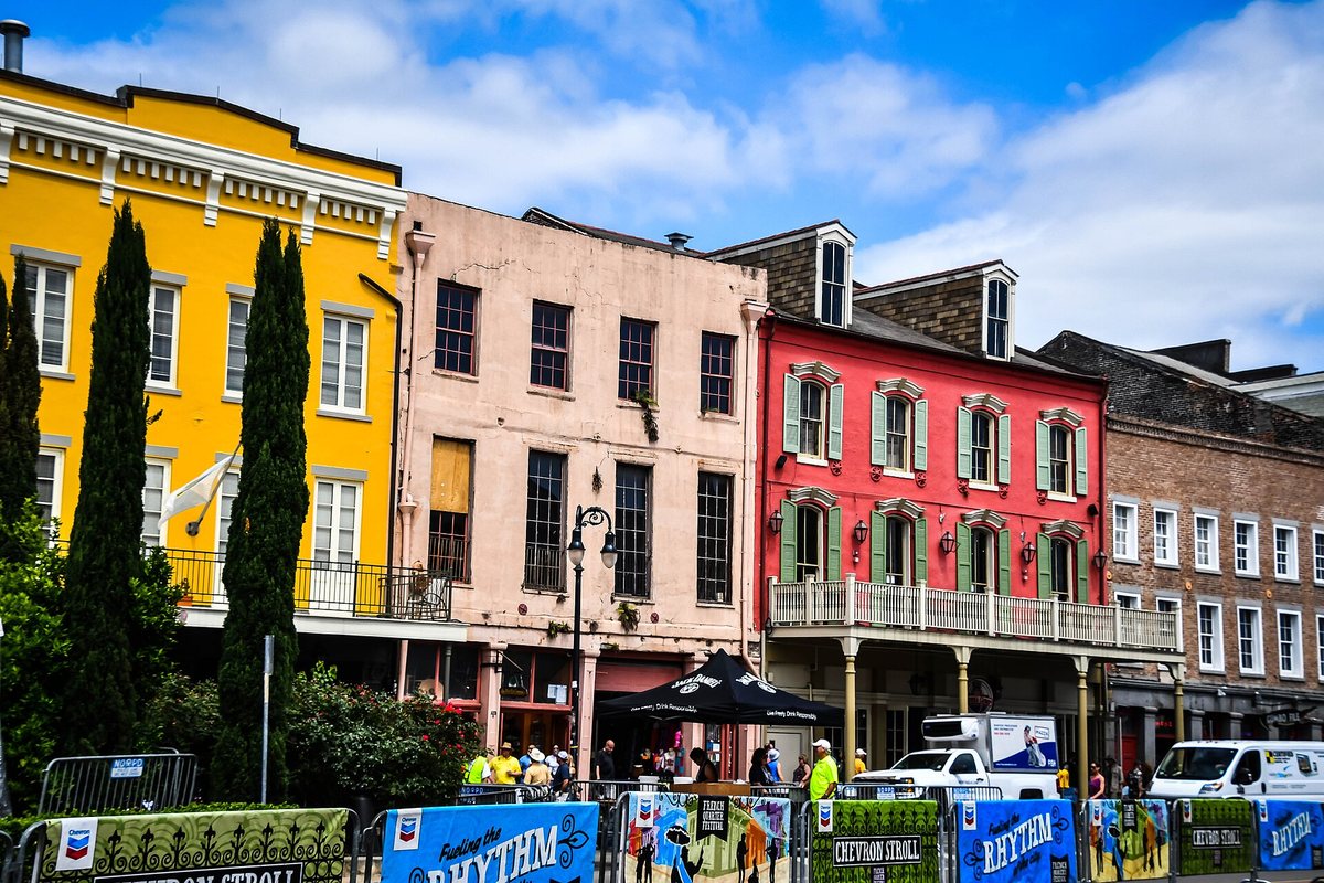 Colorful balconies and storefronts on Decatur Street in New Orleans