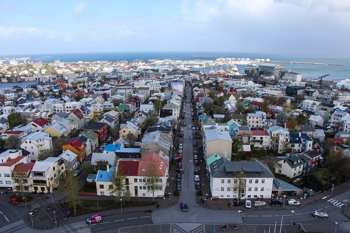 An elevated view along a street through colorful buildings in Reykjavik
